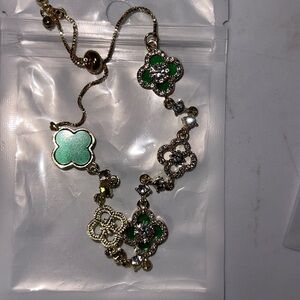 Elegant Green and Gold Floral Bracelet